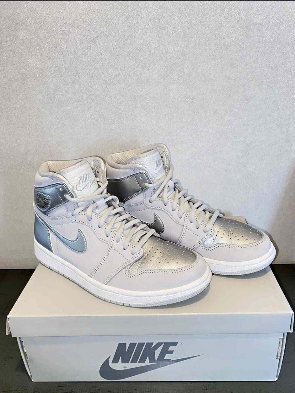 Nike High-Top Sneakers in Metallic Silver and White